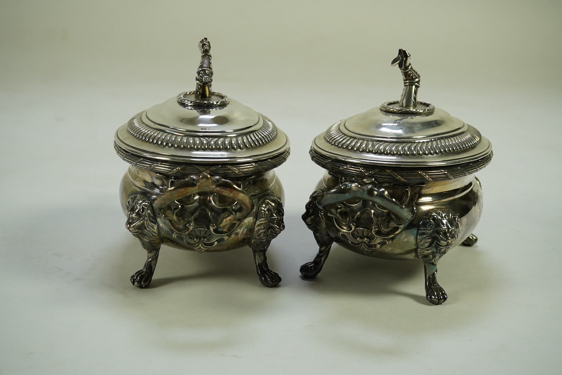 A pair of George III silver two handled oval sauce tureens and covers, by Robert Garrard I